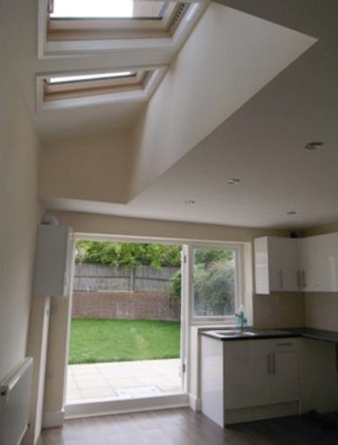 Extended kitchen with rooflights and garden access — project photograph.