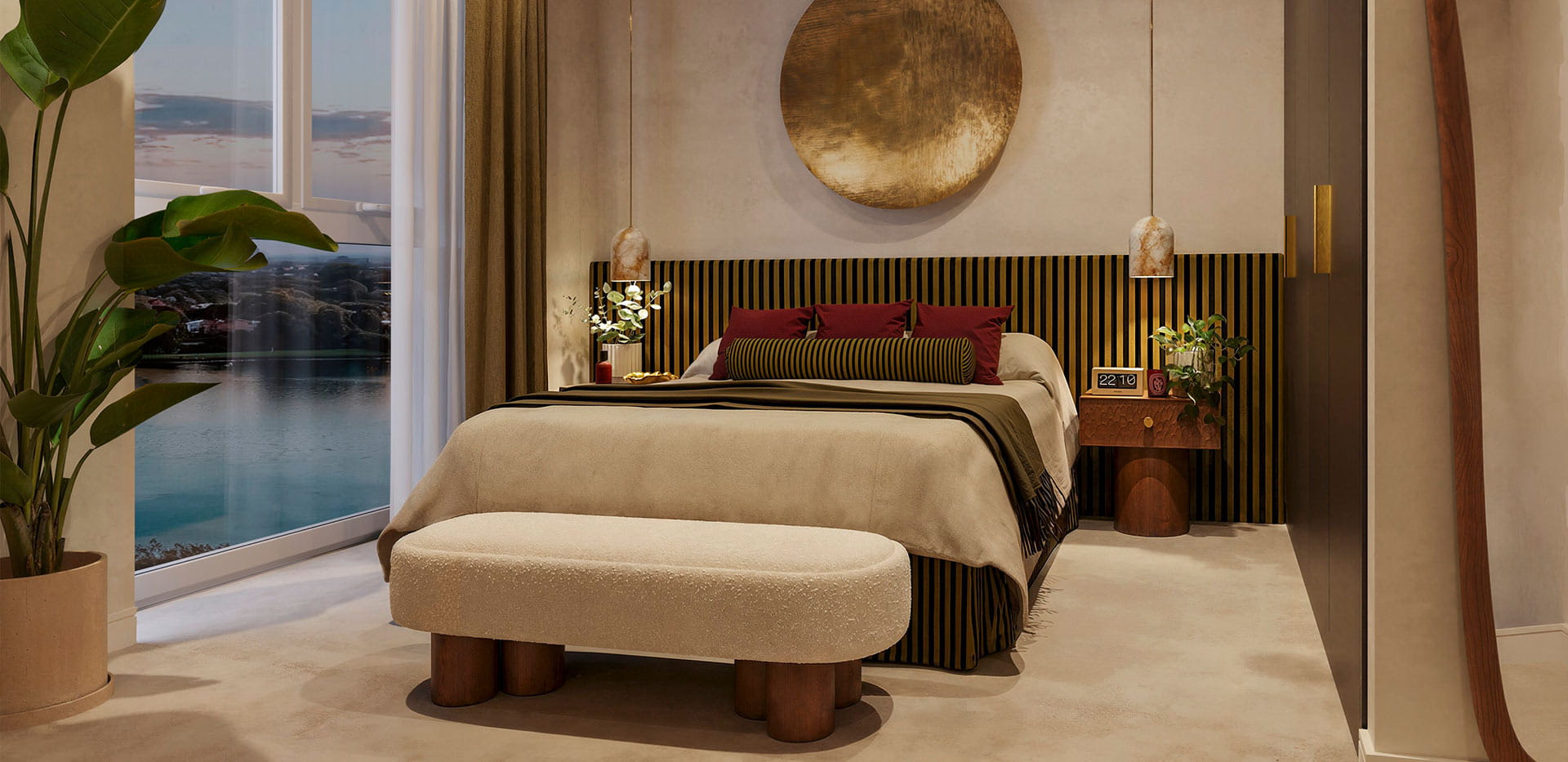 Bedroom interior with upholstered bed and waterside outlook at The Grove Collection