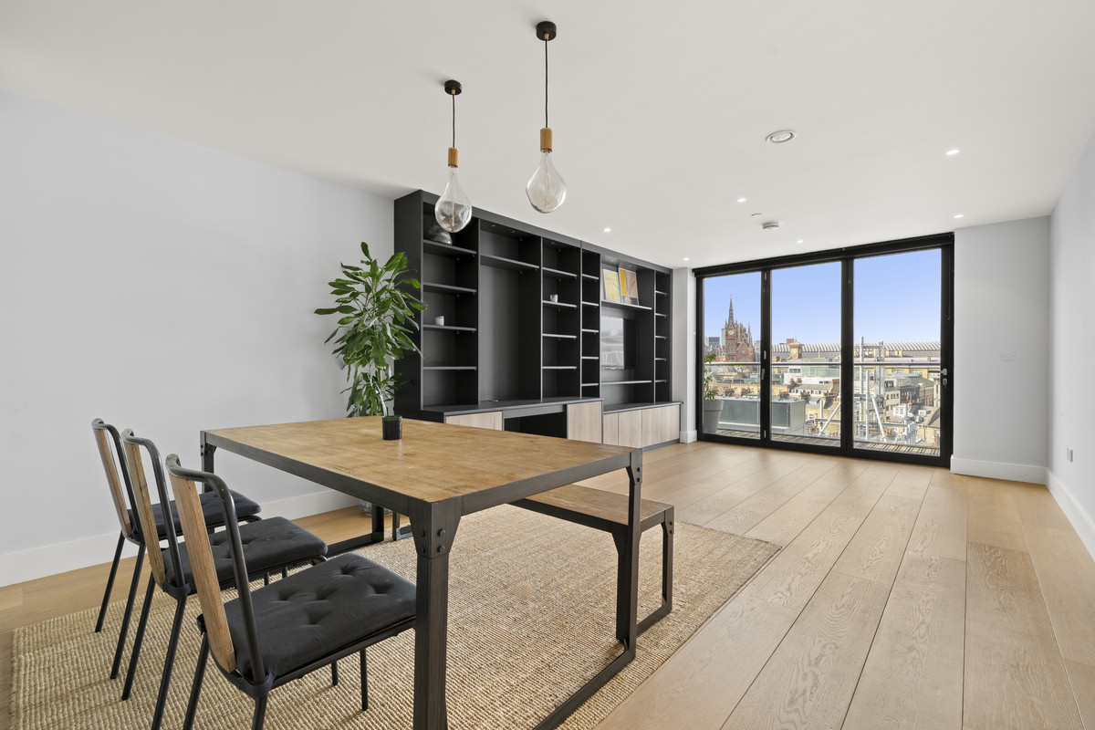 Dining area with city views — Spitfire Building