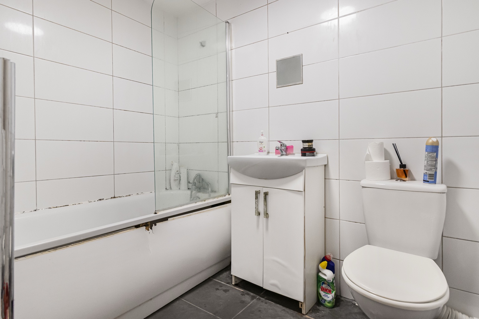 Bathroom with bath, basin and WC in the West Green Road flat.