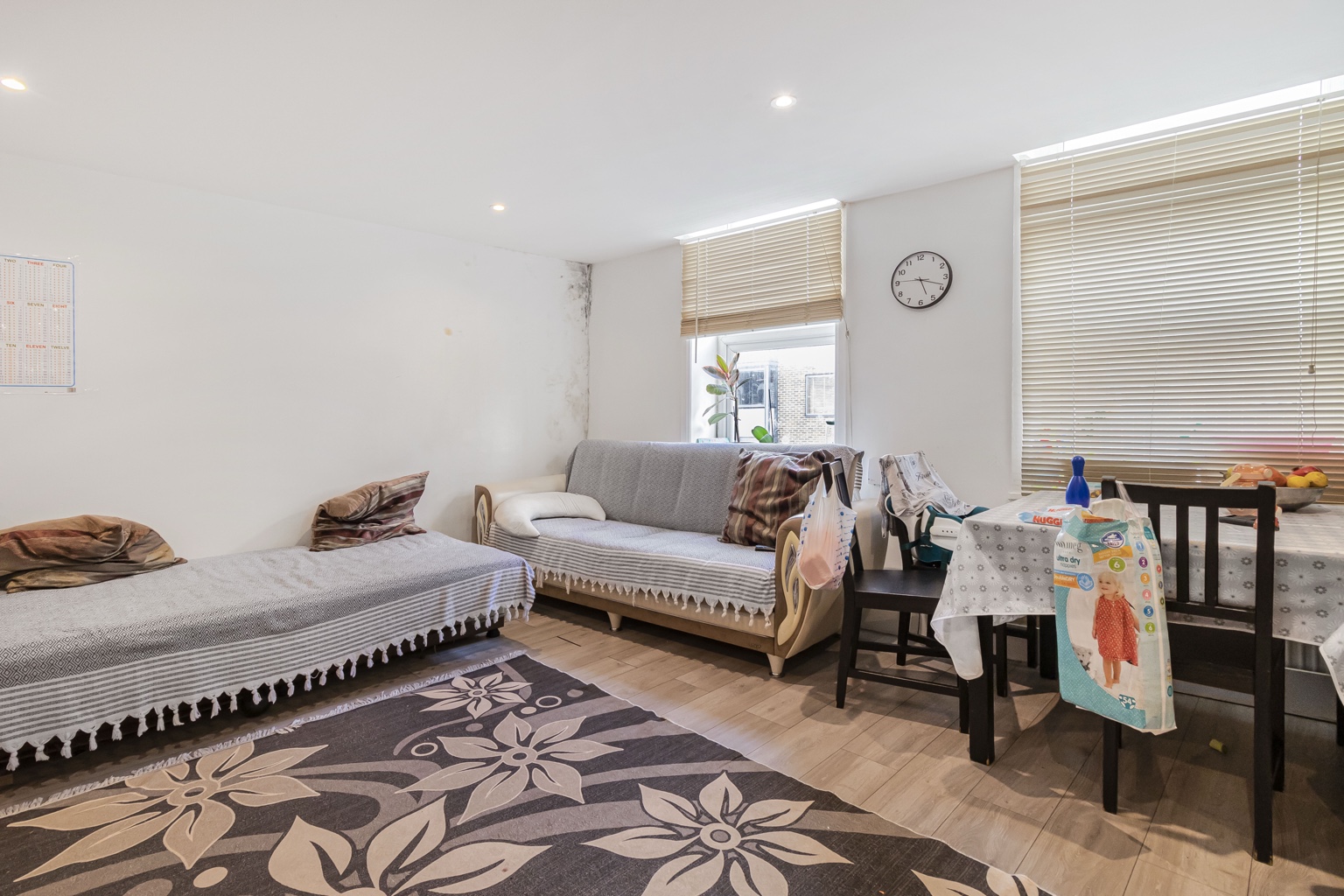 Living and dining room in the West Green Road flat.